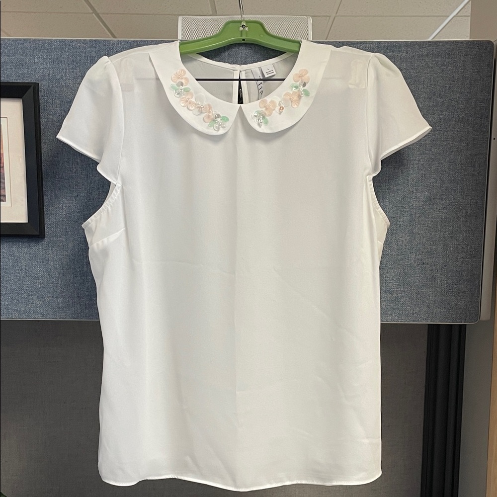 White blouse with Peter Pan collar